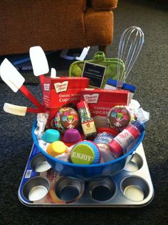 a cupcake tin filled with baking supplies