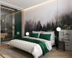 a bed with green pillows and blankets in a bedroom next to a large painting on the wall