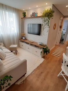 the living room is clean and ready to be used as a home office or entertainment center