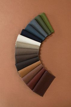 the color swatches are arranged on top of each other in different colors and patterns