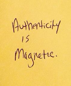 the words authenticity is magnetite written on a piece of yellow paper with black ink