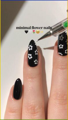 Unleash your creativity with minimalist flower nail art! 
This easy tutorial brings spring blooms to your fingertips with simple techniques. 
Get inspired and create beautiful black nails that are sure to turn heads. 
#nails #nailart #nailsofinstagram #naildesign #springnails #flowernails #blacknail Black Gel Nails, Quick Nail Art, Minimalist Nail Art, Spring Nail Designs, Pink Nail Art, Nail Art Designs Videos, Nails Polish, Spring Nail Art, Short Nail Designs