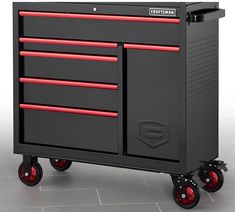 a black and red tool cabinet on wheels