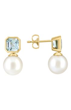 Polished 14-karat yellow gold stud earrings showcase bezel-set square-cut aquamarines nestled atop lustrous freshwater pearls for elegant shine. 1/4"W x 5/8"L Post back Total aquamarine weight: 2.0ct. Pearl size: 9mm 14k gold/aquamarine/freshwater pearl Made in the USA Aquamarine Wedding Earrings, Aquamarine Pearl Earrings, Elegant Aquamarine Earrings, Elegant Blue Aquamarine Earrings, Blue Aquamarine Gemstone Earrings, Expensive Jewelry Luxury, Aquamarine Earrings, Aquamarine Jewelry, Expensive Jewelry