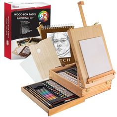 an artist's wooden easel with art supplies including pencils and watercolor paints