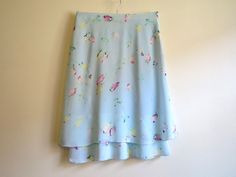 "Sky Blue Skirt Floral Print Skirt A Line Knee Skirt Floral Print Skirt Summer Skirt Light Blue Skirt Medium Size Label size: EUR 36/38 Measurements: (taken laying flat): Waist: 15\" / 38cm Hips: 20\" / 51cm Length: 25\" / 63.5cm Condition: great Vintage Condition Please check measurements to insure a proper fit. Remember to allow yourself some extra room for movement. You can compare these with something from your closet that fits you well. SHIPPING * I ship worldwide via Priority mail. * I shi Light Blue Lined Mini Skirt, Light Blue Flowy Lined Maxi Skirt, Flowy Light Blue Lined Maxi Skirt, Light Blue Long Skirt For Summer, Light Blue Flowy Mini Skirt, Blue Flowy Long Wrap Skirt, Flowy Blue Long Wrap Skirt, Fitted Light Blue Tiered Skirt, Light Blue Mini Skirt With Lining