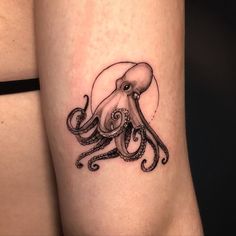 an octopus tattoo on the right thigh