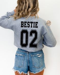 Custom Bestie Sweatshirt, Bestie 01-02 Hoodie, Besties Matching Shirt, Best Friends Sweatshirt, Besties Hoodie, Best Friend Matching Gift  Price is for per item. This item is just for a shirt, not a set. Shirts are sold separately. Please, add as many as you need to your cart  CAUTION: For security reasons, there is no rope in the throat area for youth hoodie. Hello!! We wish everyone to smile with our cute, stylish, and trendy graphic sweatshirts and hoodies. We assure you these sweatshirts and Fan Merchandise Cotton Hoodie With Crew Neck, Cotton Hoodie Crew Neck For Fan Merchandise, Cotton Crew Neck Hoodie For Fan Merchandise, Cotton Fan Merchandise Hoodie Sweatshirt, Fan Merchandise Cotton Hoodie Sweatshirt, Hip Hop Long Sleeve Sweatshirt For Fans, Hip Hop Style Long Sleeve Sweatshirt For Fans, Winter Fan Merchandise Crew Neck Hoodie, Varsity Style Crew Neck Fan Merchandise Hoodie