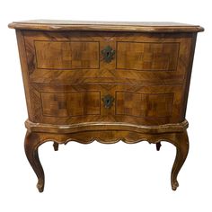 an old wooden chest with drawers on it