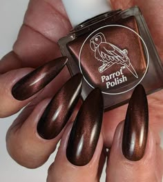 PRICES MAY VARY. When used with a neodymium magnet, this dark brown Liberty Belle magnetic nail polish provides a textured appearance. This deep brown nail polish features metallic particles that are activated when the magnet is placed over the wet polish. The metal particles rise toward the magnet, creating a unique design that gives your manicure a one-of-a-kind look. A premium magnetic polish, this is an excellent option for both natural and acrylic nails and can be used in multiple coats for Metallic Nail Colors, Brown Nail Polish, Brown Nail, Magnetic Nail Polish, Brown Nails Design, Fall Nail Trends, Magnetic Nails, Metallic Nails, Cat Eye Nails