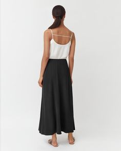 Our favorite statement skirt, now updated in Washable Silk, with a flowy, comfortable silhouette. Statement Skirt, Silk Maxi Skirt, Silk Maxi, Favorite Sweater, Black Media, Cold Day, High Boots, Warm Weather, New Black