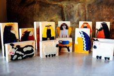 several small wooden blocks with animals on them