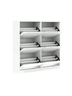 three white shelves with pillows on them