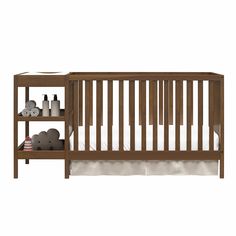 a wooden crib with shelves for baby's toys