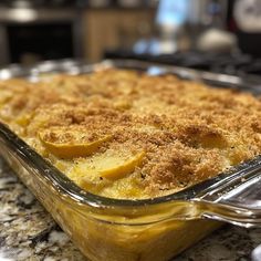 a casserole dish is sitting on the kitchen counter ready to be eaten and served