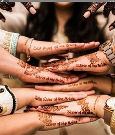 many hands with hendi designs on them are stacked up in a circle and the words god friend of the bride written on their palms