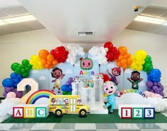 children's birthday party decorations including balloons, toys and decor for the school year