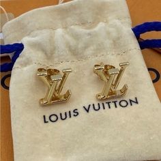 Louis Vuitton Iconic Stud Earrings, Nwt. Comes With Pouch, Tag, Box, Ribbon And Gift Card. The Lv Iconic Earrings Make For A Thoughtful Gift For Lovers Of The House. The Pair Takes The Lv Initials And Formats Them Into Miniature Size Studs That Are Perfect For Everyday Wear. Price Firm, No Trades, Bundle Discount Does Not Apply Louis Vuitton Earrings, Monogram Earrings, Box Ribbon, Preppy Jewelry, Louis Vuitton Jewelry, Circle Monogram, Louis Vuitton Accessories, Jewelry Lookbook, Girly Jewelry