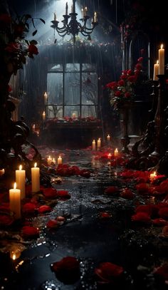 a dark room with candles and roses on the floor