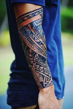 Person with intricate tribal tattoo sleeve on right forearm. Unique Sleeve Tattoos, Tattoos Men