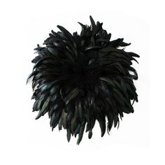 a black feather ball on a white background