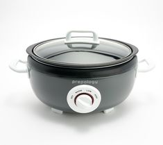 an electric crock pot with the lid open on a white background, showing the handle and knobs