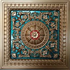 an intricately designed ceiling tile in gold and blue