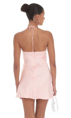 Designed in Los Angeles- Mini Length- Zipper and back tie closure- Fully lined- Sheer- Made in satin fabric- Hand wash coldModel is wearing a size small that measures 31in/79cm in lengthSlight modifications might be made to improve garment quality.Handling the garments with care, hand-washing and air-drying is strongly recommended. Hoco Inspo, Satin Halter Dress, Pink Dress Short, Women Sleepwear, Floral Halter Dress, Pink Mini Dress, Loungewear Jumpsuit, Silk Mini Dress, Hoco Dresses