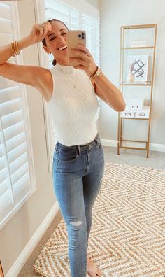 These high waisted skinny mom jeans hug you in all the right places and are one of my most flattering pair of jeans! The sleeveless turtle neck is comfortable and soft, but the white is see-through. Just pair it with a racerback tank top underneath to combat the sheerness! White top and blue jeans will always be a classic when it comes to everyday casual style! My go to momiform, mom style mom fashion! Turtle Neck Tank Top Outfit, Neck Tank Top Outfit, White Top And Blue Jeans, White Shirt And Blue Jeans, Tank Top Outfit, Casual 90s, Mom Fashion, Tank Top Outfits