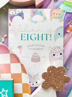 there is a birthday card and other items on the table