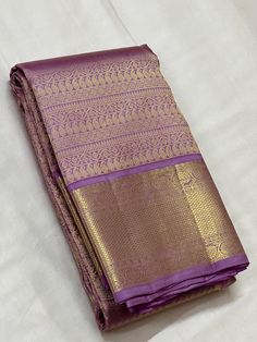 Bridal Collection Light Violet Color Pure Kanchipuram Silk Saree | Indian Traditional Ethnic Saree | Wedding or Party Wear Saree | Handwoven Gift Saree for Her Product Details : Saree Type : Pure Kanchipuram Silk Saree Golden Zari, Silk Mark Certified Blouse Piece : Yes (Un-Stitched) Saree Length : 5.5 Meters Blouse Piece Length : 80 cm Saree Weight : 0.9 kg Saree Fabric : Pure Kanchipuram Silk  Color : As shown in the picture Work : weaving Pattern : designer Occasion: Party Wear, Formal Wear, Gold Saree For Eid Ceremonial Occasion, Purple Brocade Traditional Wear For Puja, Traditional Purple Ceremonial Wear, Ceremonial Gold Paithani Silk Lehenga, Ceremonial Gold Lehenga In Paithani Silk, Gold Brocade Saree For Puja, Ceremonial Gold Brocade Saree, Gold Ceremonial Saree With Self Design, Gold Brocade Saree For Ceremonial Occasions