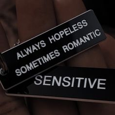 two black and white tags that say, always hopeless sometimes romantic or sensitiveive