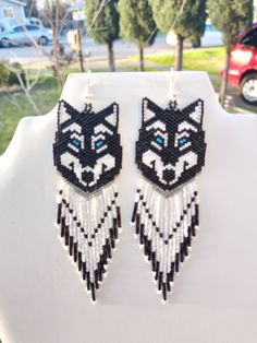 Native American Style Beaded Black Wolf Earrings. 5 inch long and 1 1/2 inch wide. Very nice Gift for the Woman in your life. If you have any Questions, please ask. Thanks for looking Beaded Earrings Native Beadwork, Native American Beadwork Earrings, Wolf Earrings, Beaded Earrings Native, Native American Beaded Earrings, Beaded Earrings Diy, Diy Jewelry Unique, Earrings Patterns, Native American Beadwork