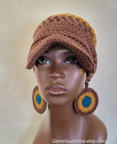 Peace! You are viewing the Everyday Crochet Cap and earrings made with acrylic yarn in a chocolate, honey and deep teal color. This hat is very lightweight☀ Size: Adult, one size fits most Circumference: 22" The earrings are made with acrylic yarn. Earring size: 3 1/2 inches in length. And of course the main ingredient is positive vibes :) All orders will be shipped US Postal Service (USPS) 1st Class with tracking and delivery confirmation. You may upgrade your order to Priority or Express Mail Handmade Brown Crochet Hat One Size, Brown Crochet Yarn Hat One Size, Brown Crochet Yarn Hat, Brown Crochet Hat One Size, Adjustable Crochet Brown Hat, Handmade Brown Hat One Size, Brown Acrylic Hats One Size Fits Most, Adjustable Brown Brimmed Crochet Hat, Brown Crochet One Size Hat