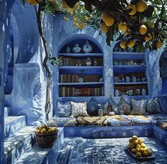 a room with blue walls and shelves filled with lemons