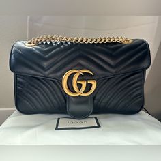 Authentic Gucci Gg Marmont Small Shoulder Bag Used: Very Good Condition (Stored In Original Dust Bag And Box) The Box And Dust Bag Are Included. No Major Scratches Or Damages, Very Clean. Non-Smoking Household. Only Used Maybe 8 Times. Style 443497 Dtdit 1000 The Small Gg Marmont Camera Bag Has A Softly Structured Shape And A Flap Closure With Double G Hardware. The Sliding Chain Strap Can Be Worn Multiple Ways, Changing Between A Shoulder And A Top Handle Bag. Made In Matelass Chevron Leather W Gg Marmont Small Shoulder Bag, Gucci Gg Marmont, Gg Marmont, Small Shoulder Bag, Heart On, Handle Bag, Long Wallet, Chain Strap, Gucci Bag