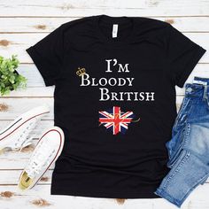 4X I'm Bloody British Unisex Softstyle T-Shirt The unisex soft-style t-shirt puts a new spin on casual comfort. Made from very soft materials, this tee is 100% cotton for solid colors. Heather colors and sports grey include polyester. The shoulders have twill tape for improved durability. There are no side seams. The collar is made with ribbed knitting to prevent curling damage. .: 100% Cotton (fiber content may vary for different colors) .: Light fabric (4.5 oz/yd² (153 g/m .: Eurofit .: Tear-a Funny British, Uk Flag, Uk Gifts, Pride Tshirts, The Pond, T Shirt Funny, Cool Tees, Kids Tops, Twill Tape