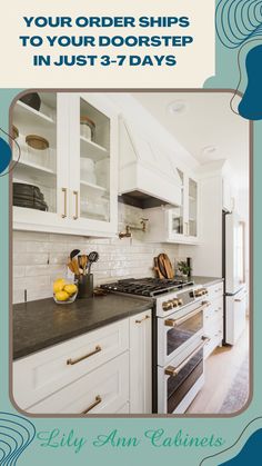 a kitchen with white cabinets and black counter tops, along with an open oven door