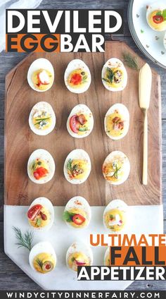 deviled egg bar ultimate appetizer recipe on a cutting board with utensils