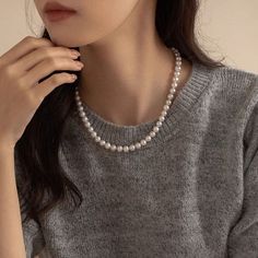 Indulge in luxury with our Natural Mabe Pearl Double Layered Necklace. This sophisticated piece is the perfect gift for her, combining elegance and beauty. The natural pearl adds a touch of exclusivity, making this necklace a truly unique and timeless addition to any collection. Material: 18K White Gold Plated Copper Stone: Cubic ZirconiaPearl: Mabe PearlNecklace 1: 6mm 17 Inch Round PearlNecklace 2: 8mm 17 Inch Round PearlThis necklace is made of 6mm and 8mm , which are strung on a silk thread. The pearls are a classic white color and have a high luster.Introducing our exquisite collection of high-end faux pearl necklaces, a perfect blend of sophistication and versatility. A clasp adorned with an infinity symbol, allowing you to wear the two necklaces together for a bold statement or sepa Classic Akoya Pearl Clavicle Chain Necklace, Elegant Pearl Necklace With Pendant, Elegant Long Pearl Pendant Necklace, Elegant Akoya Pearl Beaded Necklace As Gift, Elegant Akoya Pearl Beaded Necklace For Gift, Elegant Necklace With Pearl Drop And Round Beads, Classic Round Bridal Necklace, Pearl White Beaded Necklaces With Clavicle Chain, Elegant Pearl Pendant Beaded Necklace As Gift