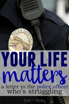 a police officer with the words your life matters