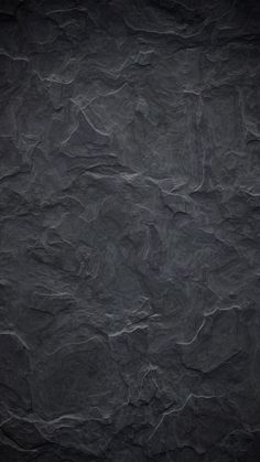 black marble textured background with dark edges