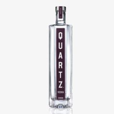 a bottle of quartz vodka on a white background