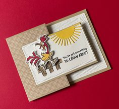 a card with an image of a rooster on it