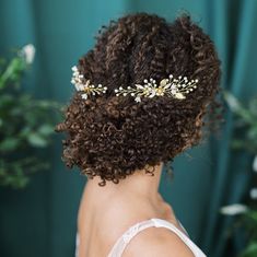 "Our Lianna bridal hair vine is the baby sister to our ARLEN hair vine.  This beautiful wedding headpiece is a bit more understated to the Arlen, but still packs a punch and is available as a single hair comb or a set of 2 to create a wrap around look!  This beautiful headpiece has sprigs and twigs of round glass pearls and hand set chaton crytsals.  Sprigs of hand sculpted clay flowers are applied throughout the piece as well as 15x4 rhinestone navette 'leaves'.  Our beautiful signature plated Bridal Hair Accessories Curly Hair, Curly Hair Flowers Wedding, Curly Hair Wedding Veil, Natural Curly Wedding Hair With Veil, Curly Hair Veil Brides, Vine With Flowers, Flowers And Crystals, Elopement Dresses, Pearl Hair Pin Wedding