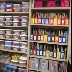 the shelves are filled with many different types of books and other things in bins