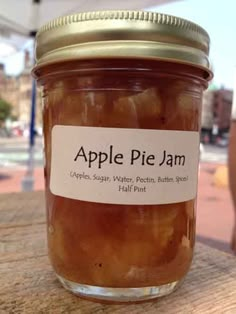 an apple pie jam is sitting on a table