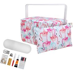 a flamingo print lunch bag with utensils and other items in front of it