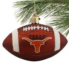 texas football ornament hanging from a christmas tree