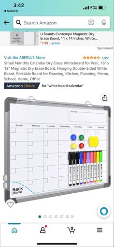 a whiteboard with markers on it next to an iphone